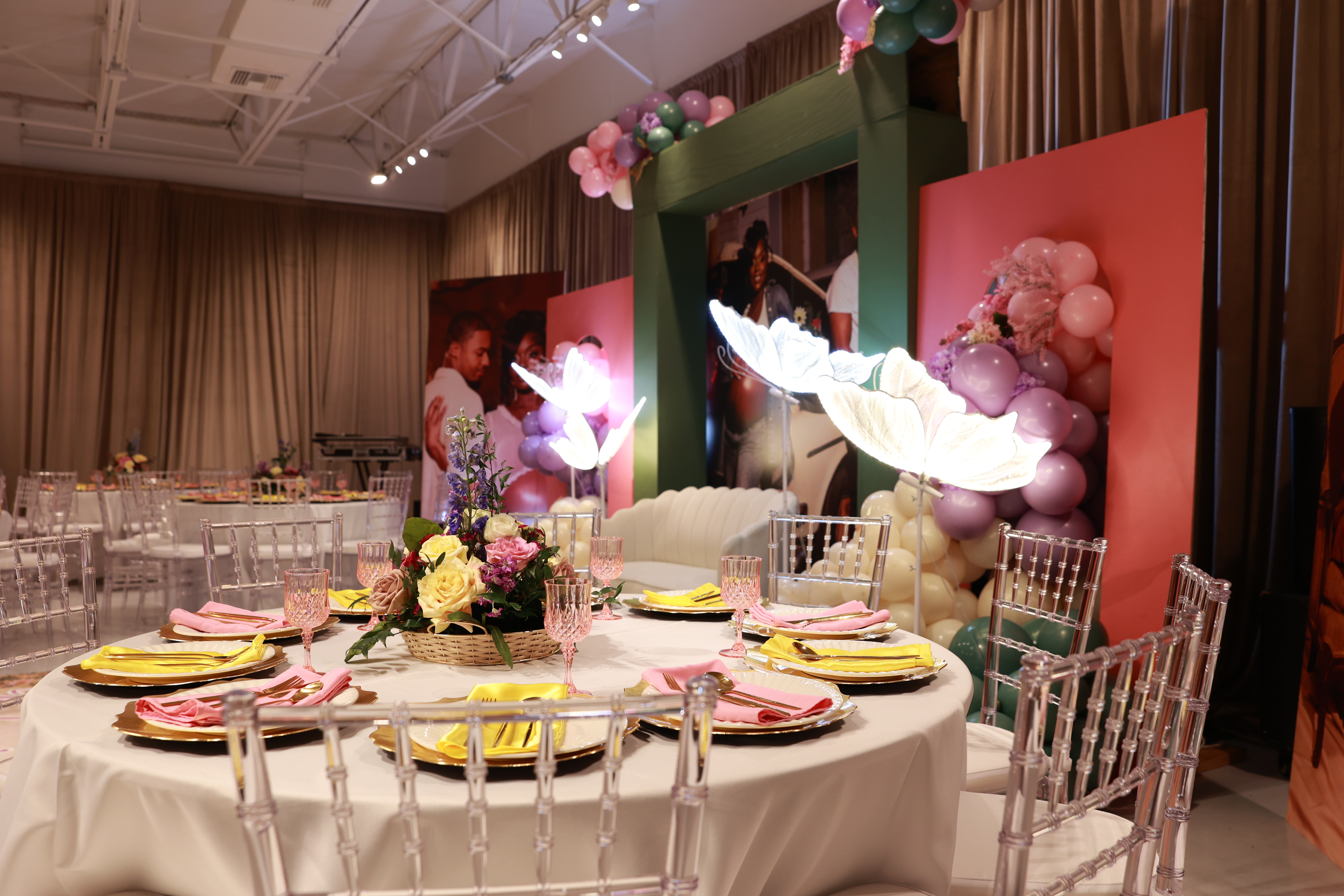 Completed Baby in Bloom room with coordinated stage, tables, and decor