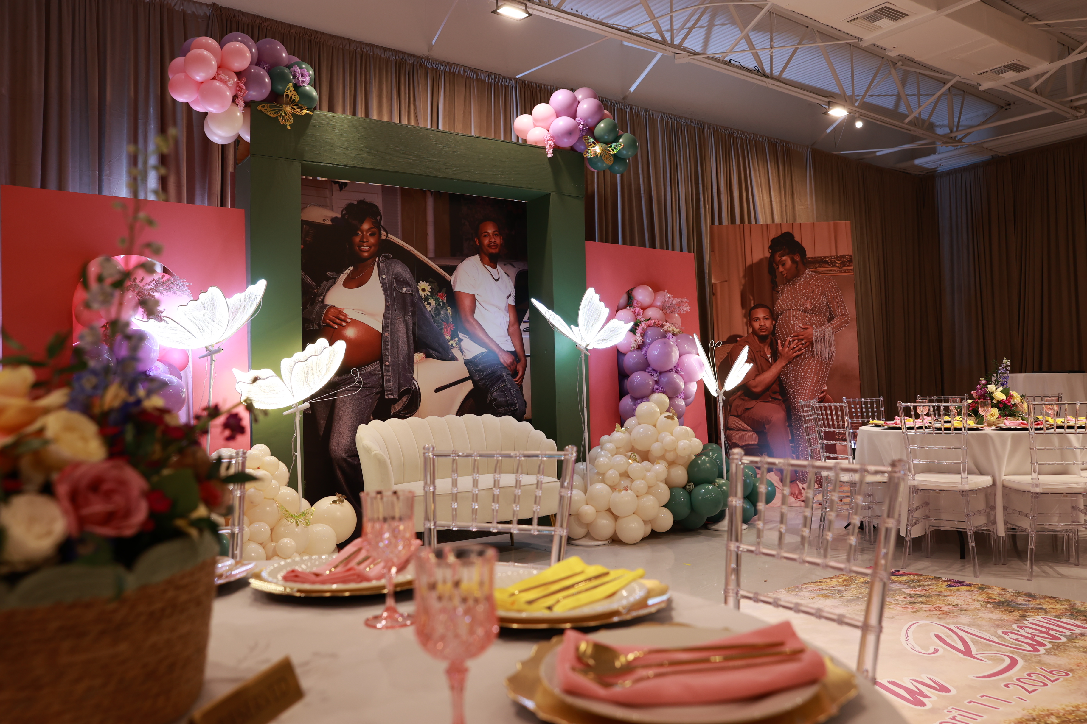 Decorated guest seating and floral tables at the Baby in Bloom shower